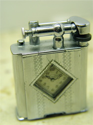 Vintage lighter w watch
Golden Wheel Watch Lighter